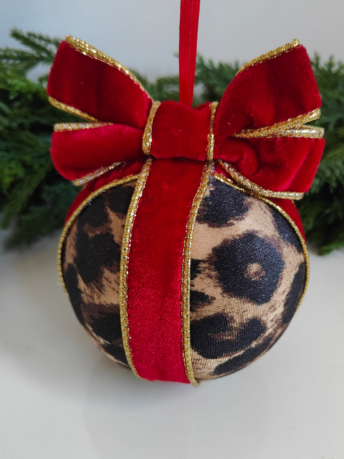 Handmade Leopard Print Christmas Bauble with Red Velvet Bow – Round