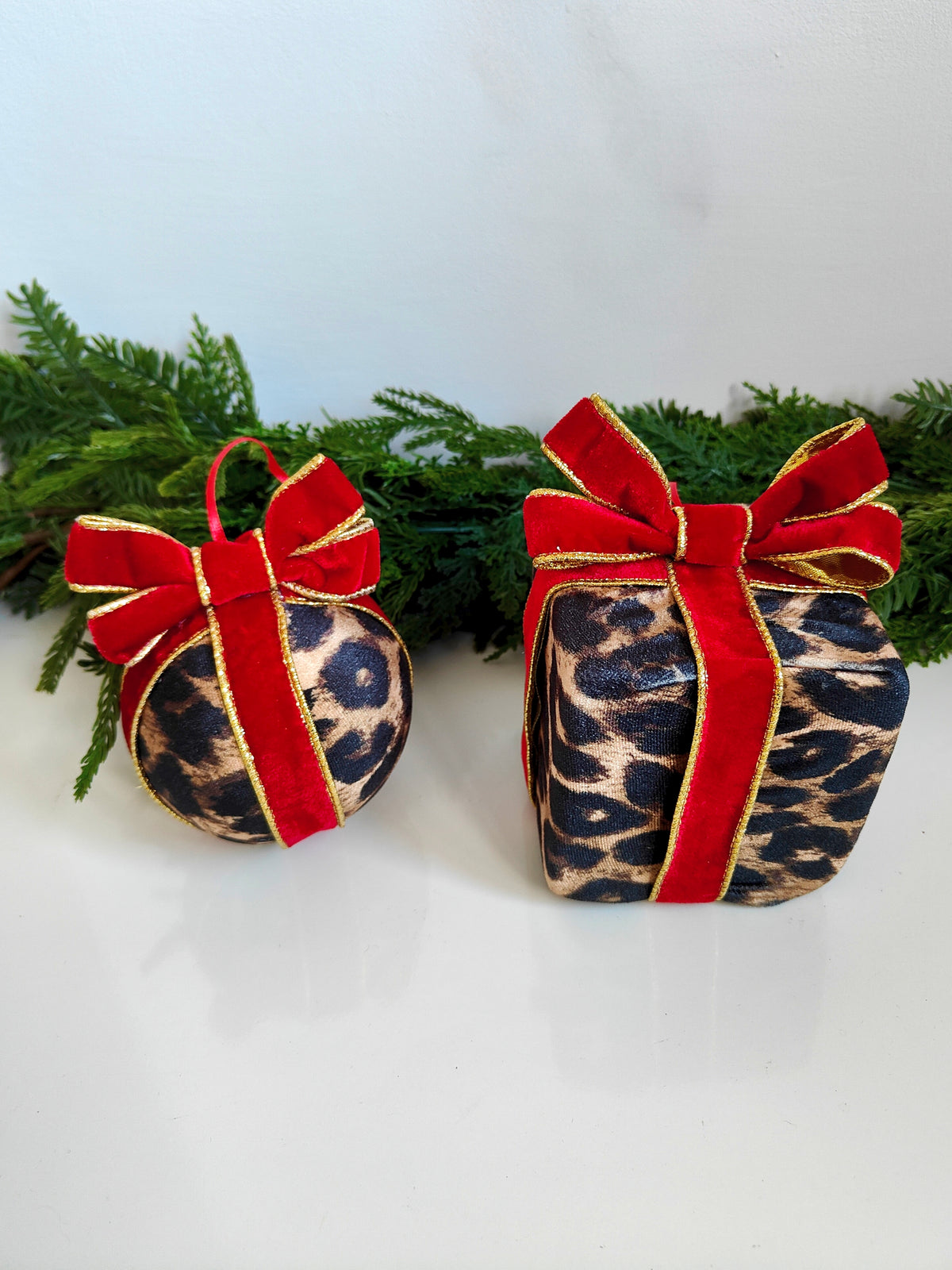 Leopard Print Christmas Bauble with Red Bow Present