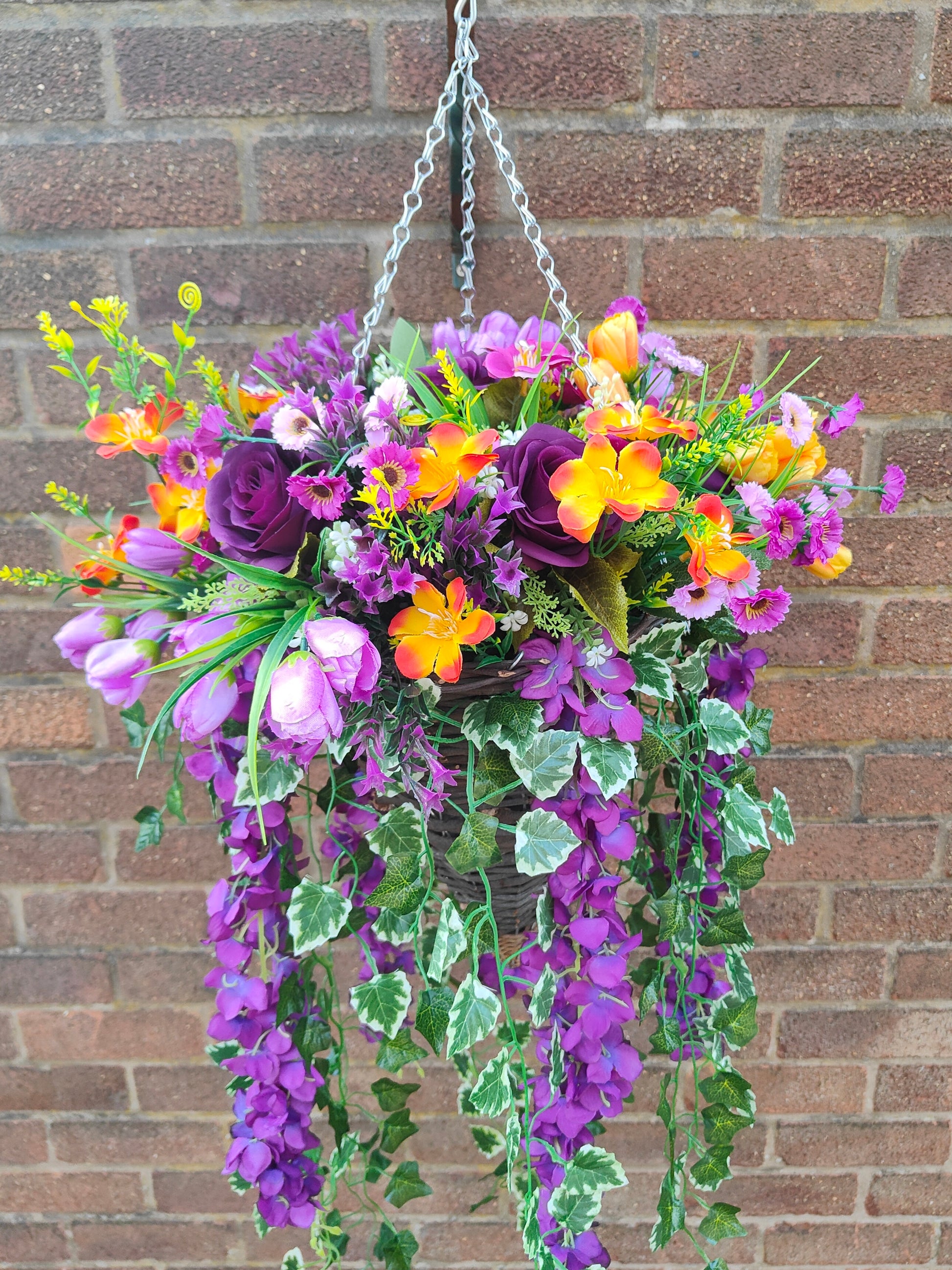 Realistic artificial hanging flower basket for outdoor use