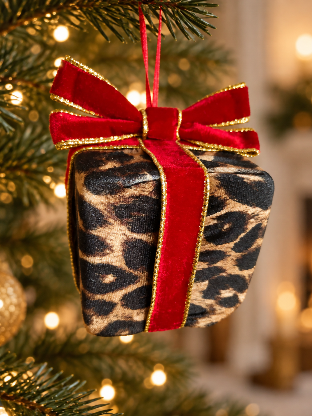 Leopard Print Christmas Bauble with Red Bow Present