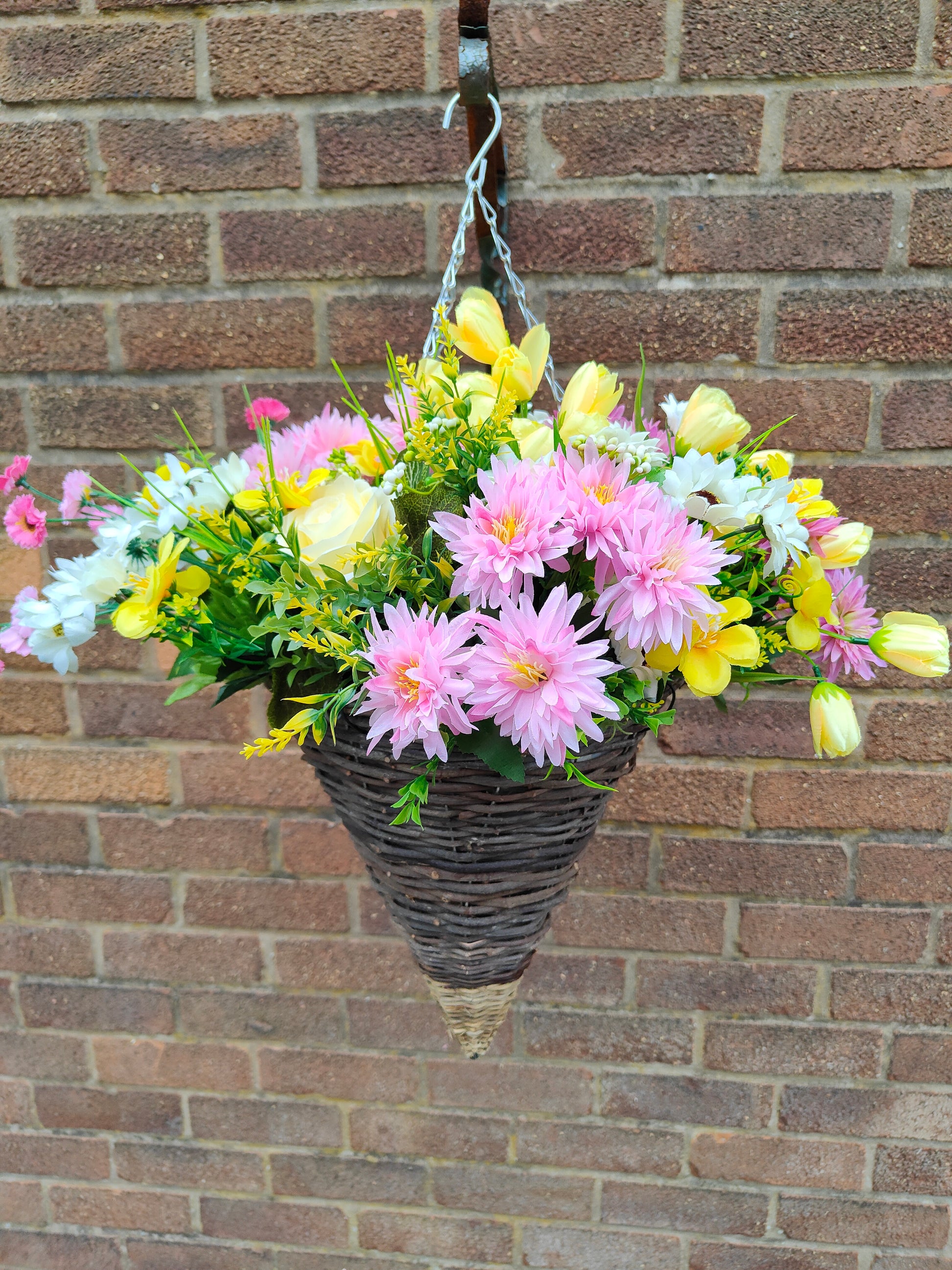 Pink yellow artificial flowers hanging basket garden pub 